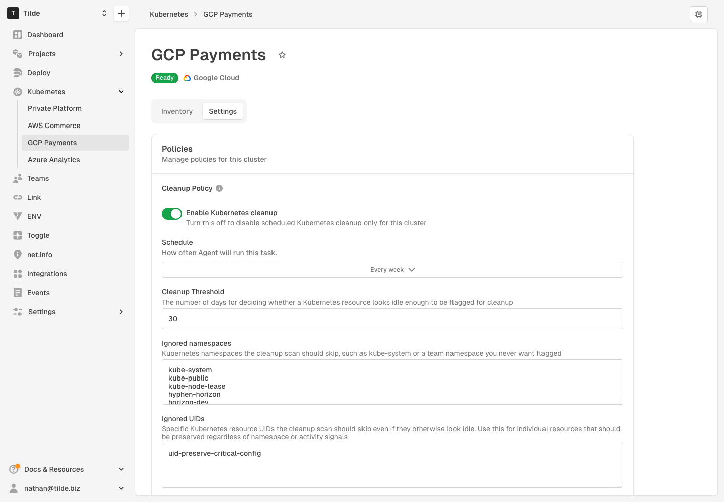 Cluster settings showing a cleanup policy override for a specific Kubernetes cluster